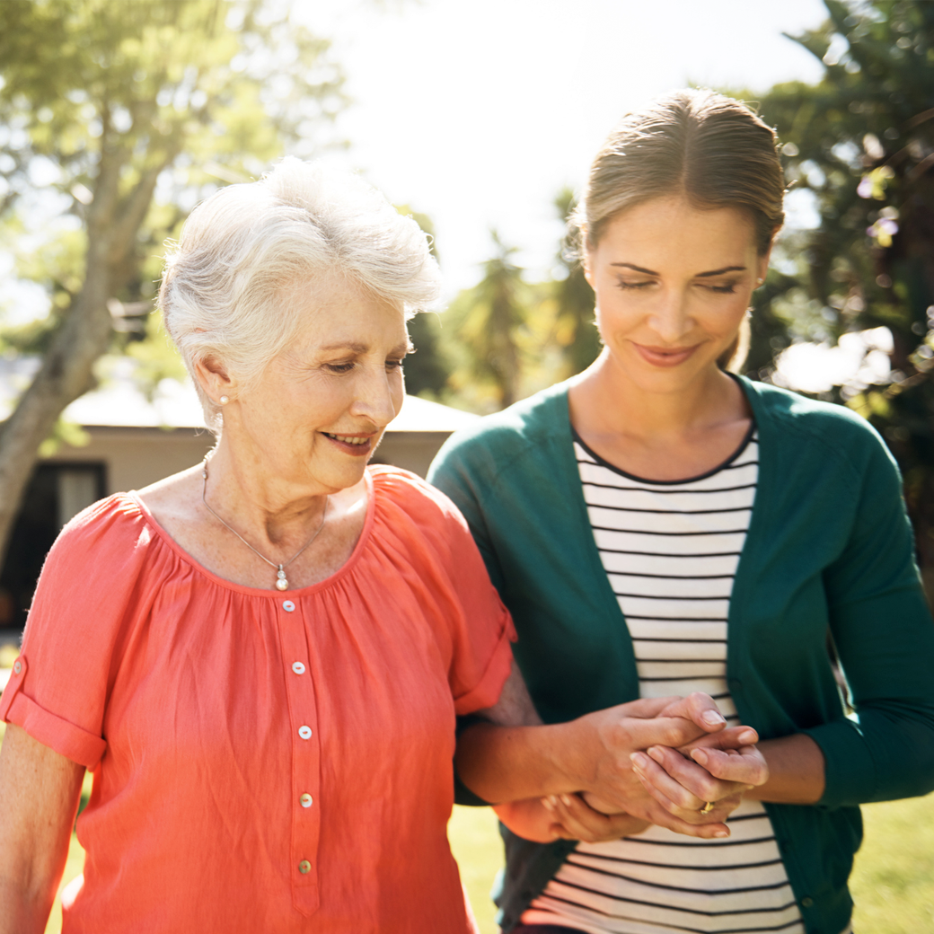 caretaker assisting woman