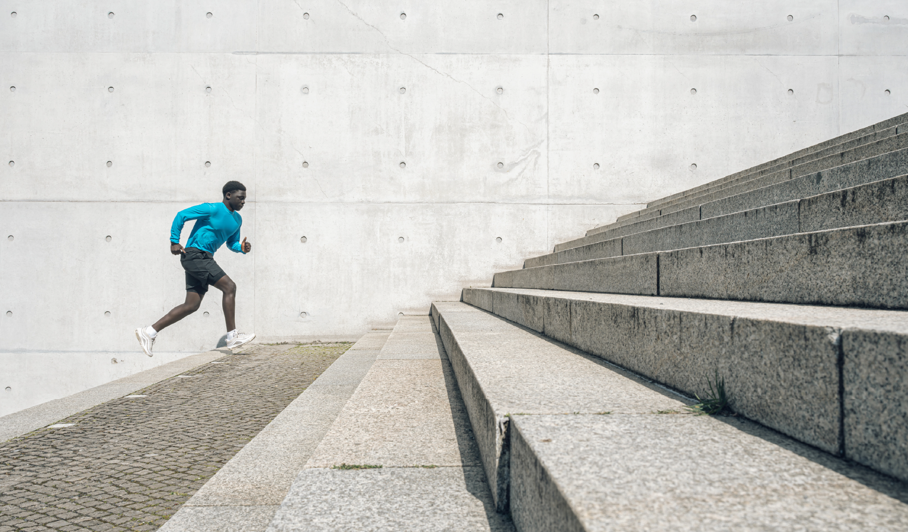 a man running up stairs