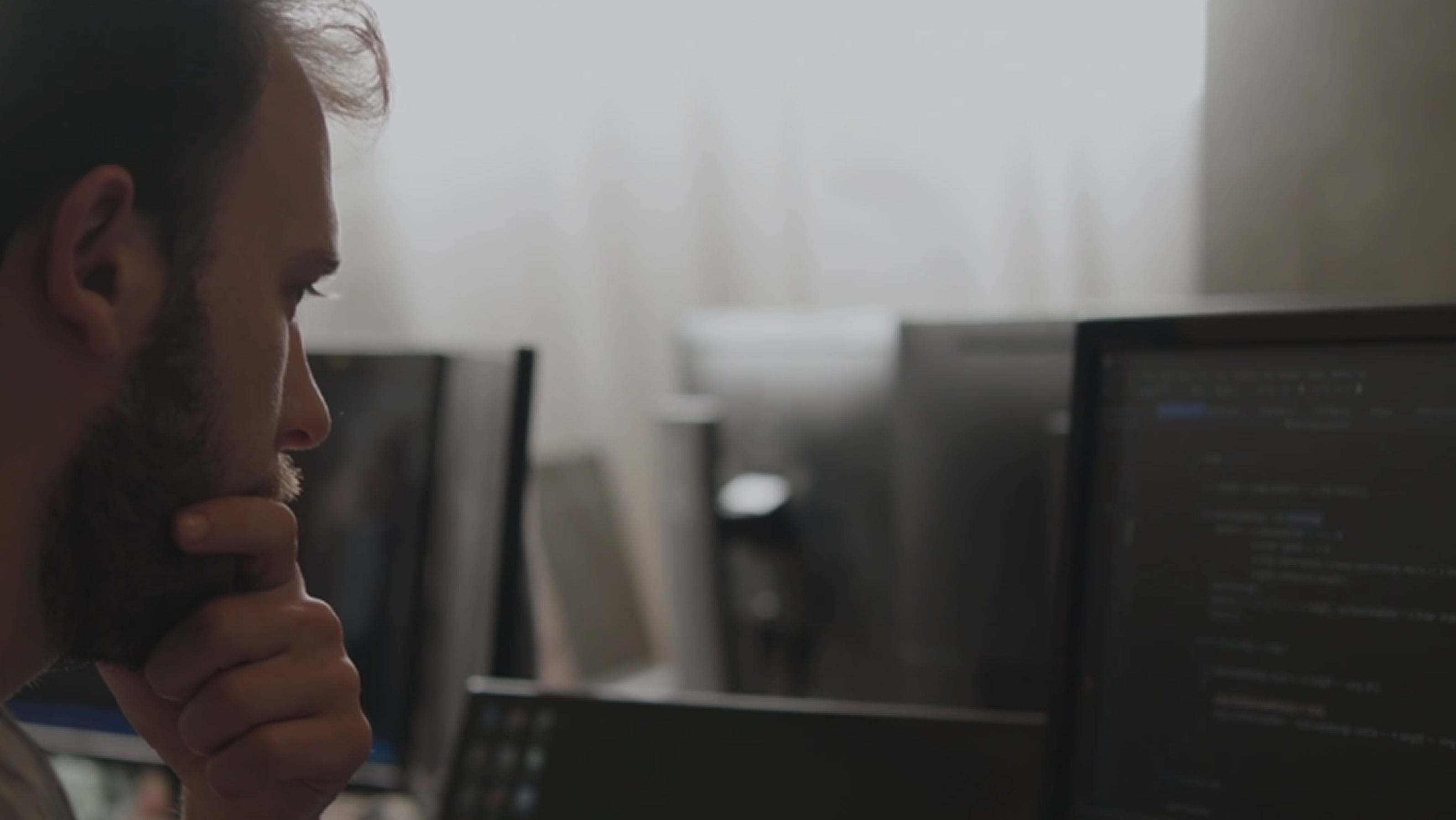 Man looking at computer screen