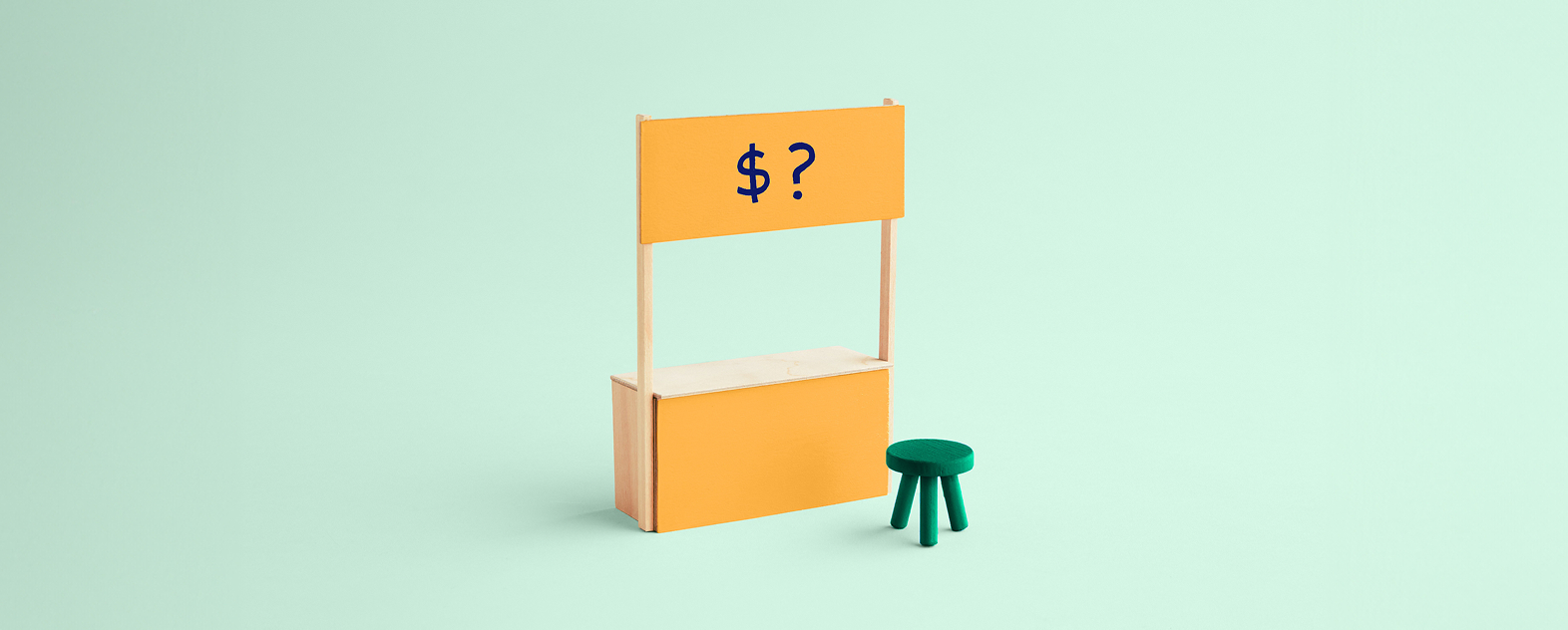 A yellow stall and a green stool