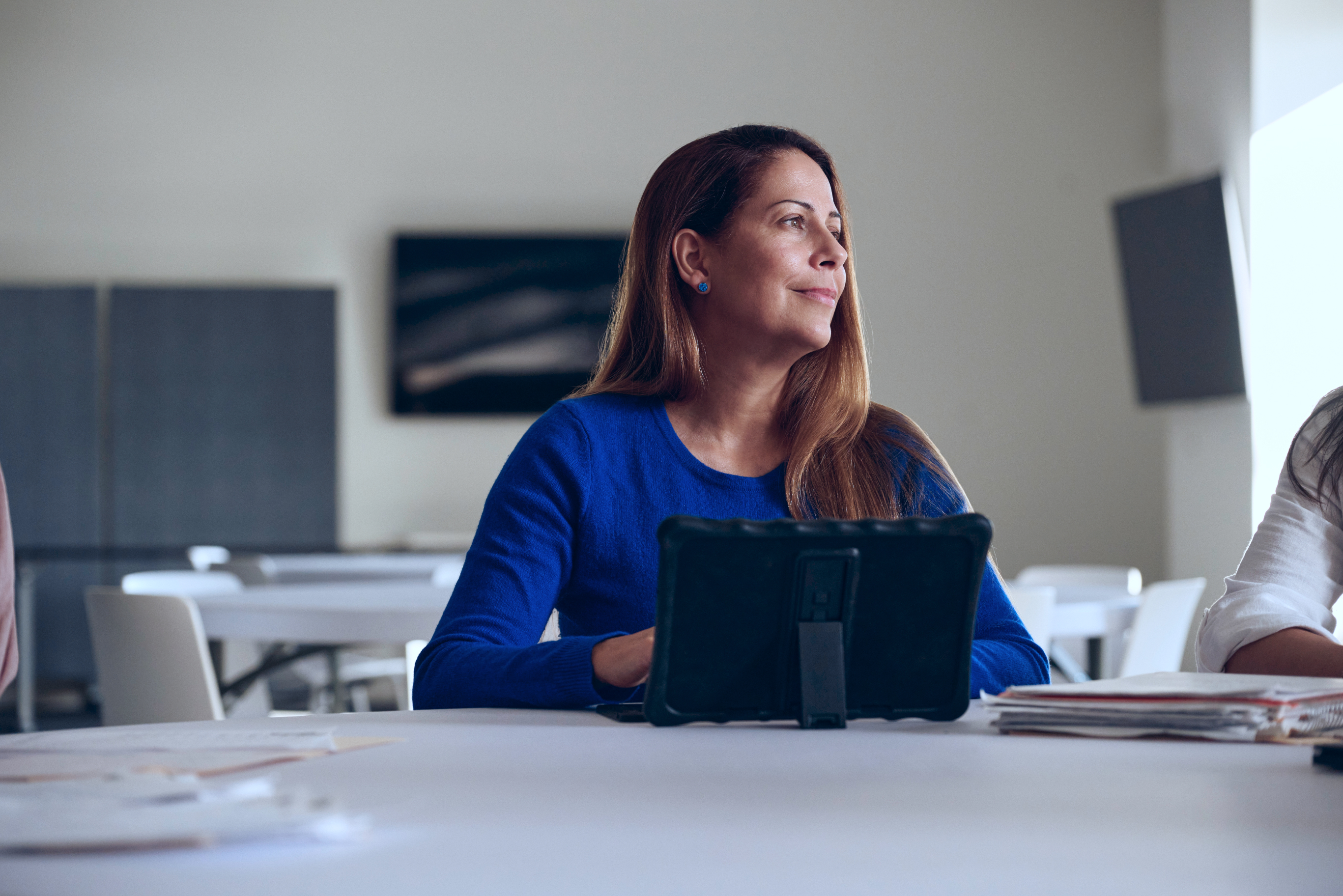 woman smiling looking to the side