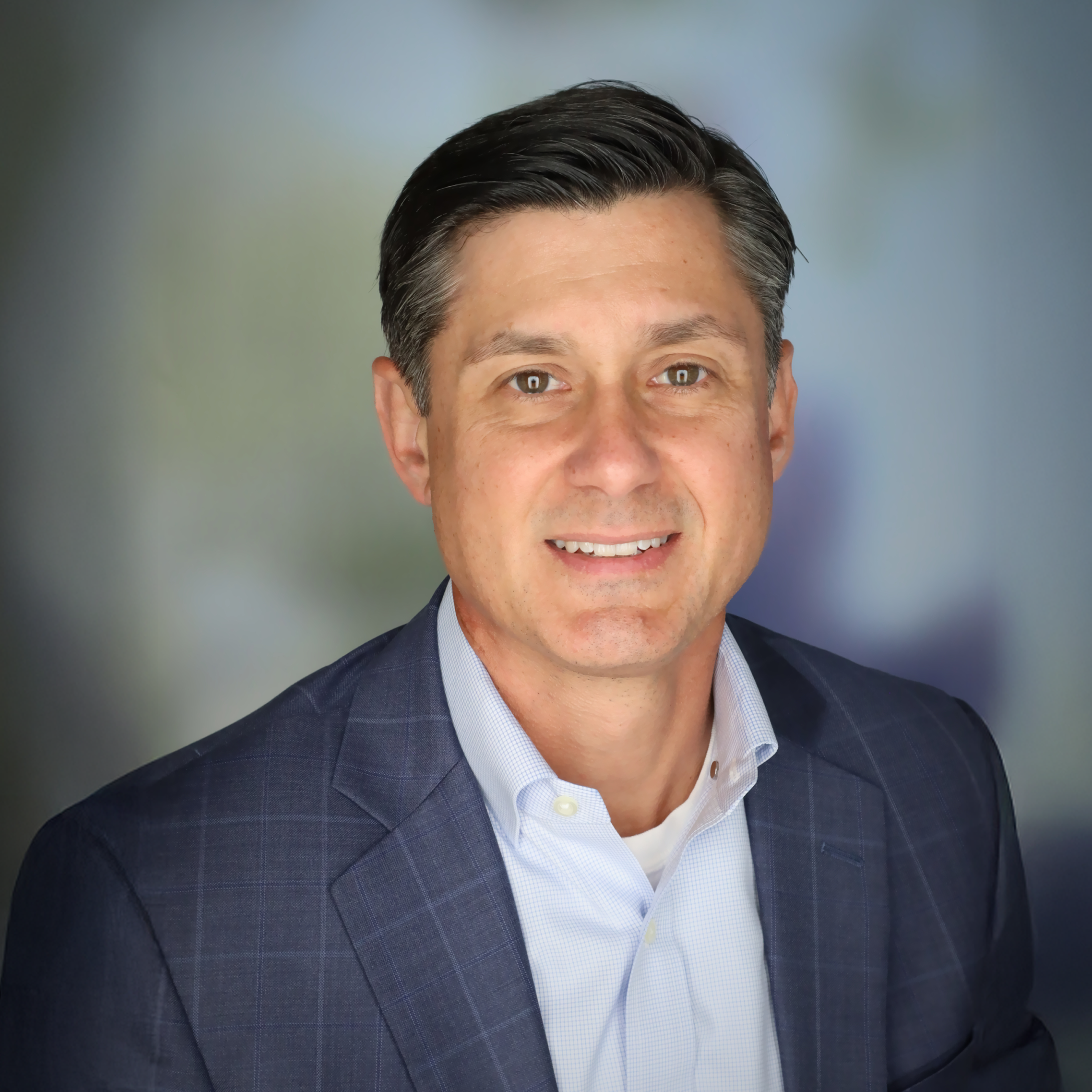 A photograph of Jason Key, head of consultant relations at TIAA