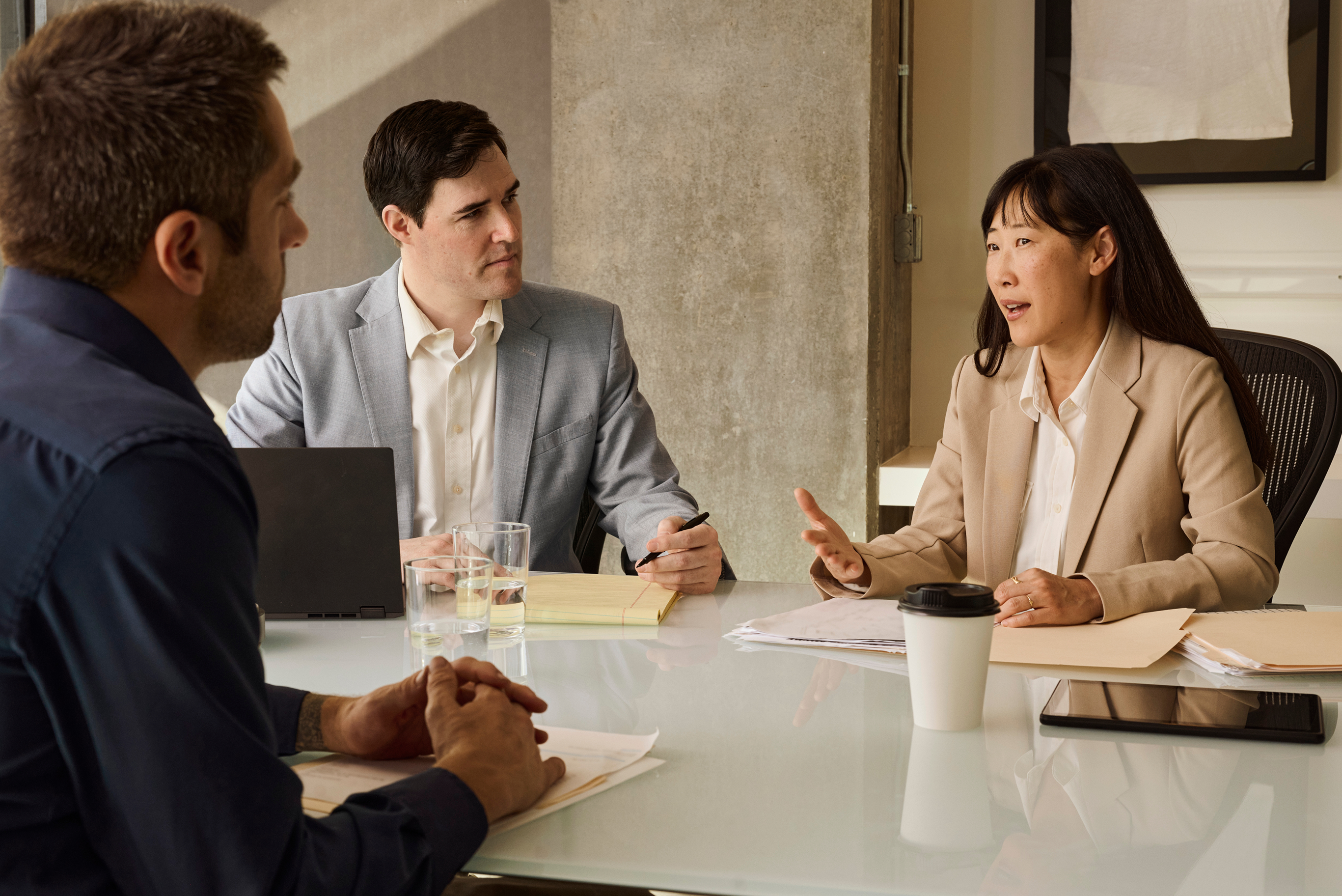 Two people in conversation with a TIAA financial consultant.