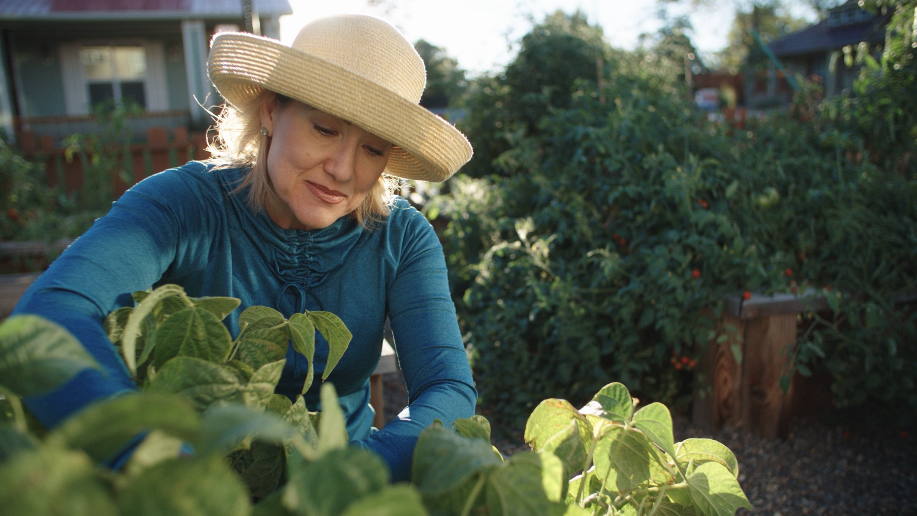 Woman gardening in hat