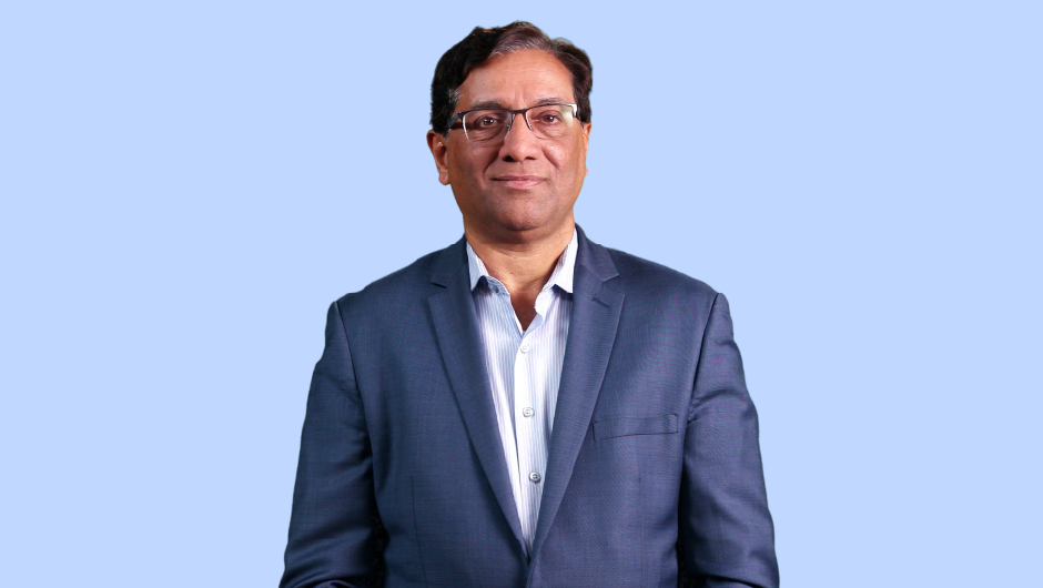A headshot of Surya Kolluri.