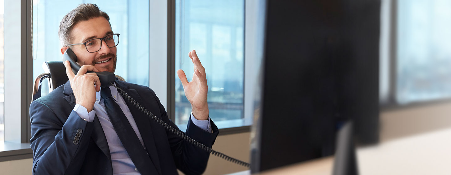 Person in Office talking on phone